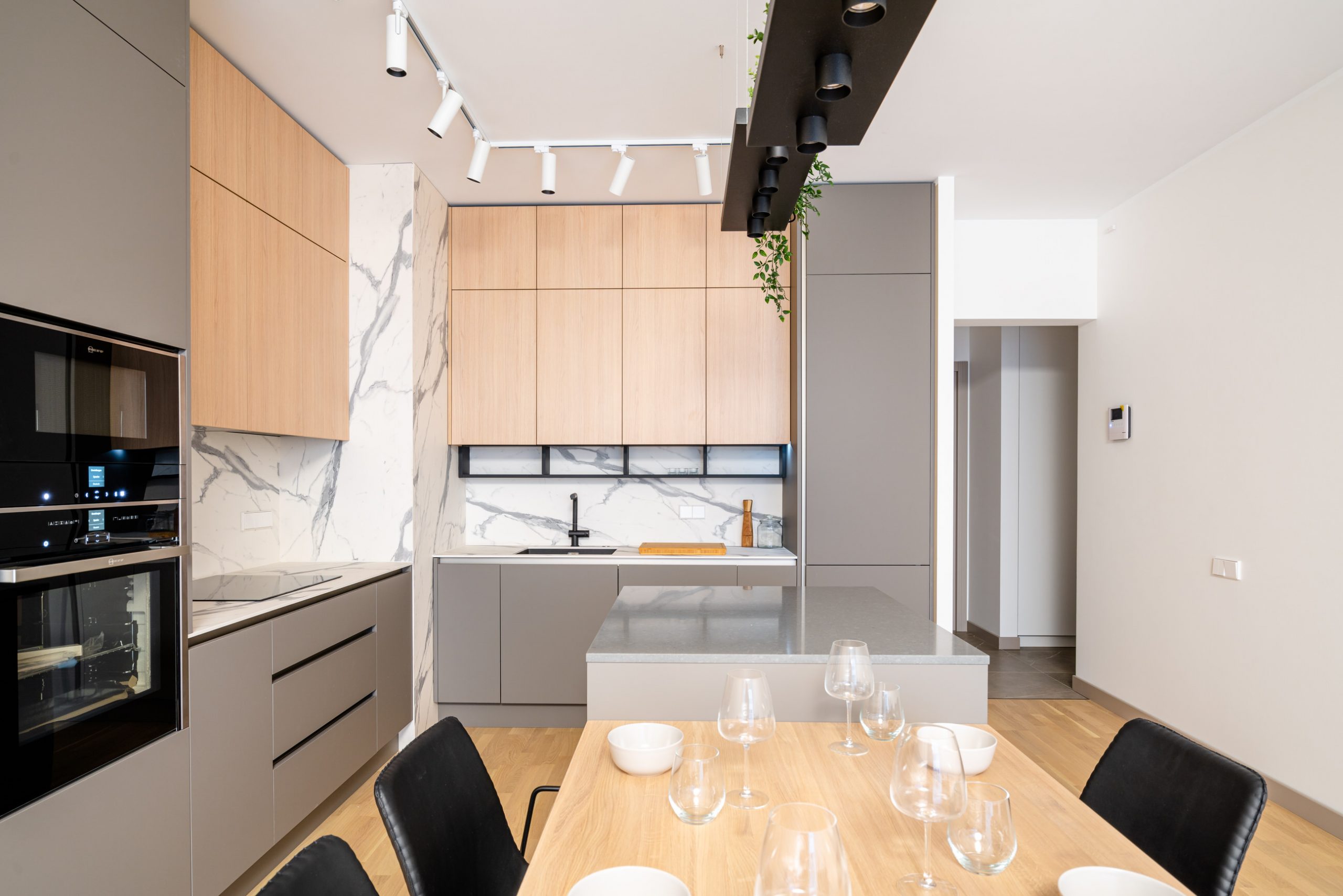 Corner kitchen in Scandinavian style in light colours